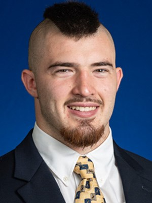 Illustration for article titled Michigan Fullback Reminds The World That Some White Men Can Jump